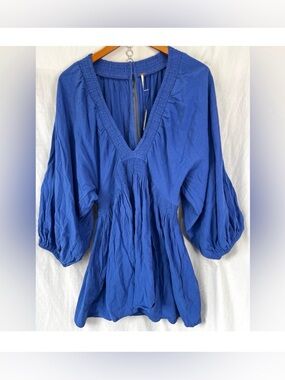 Free People Mini Dress
Mazarine Blue Puff Sleeve Deep V Neck 100 Cotton New L